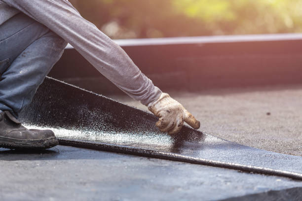 Professional Waterproofing technician working in Adams, TN
